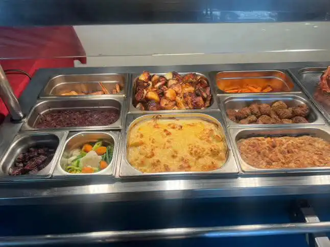 A buffet with many different types of food.