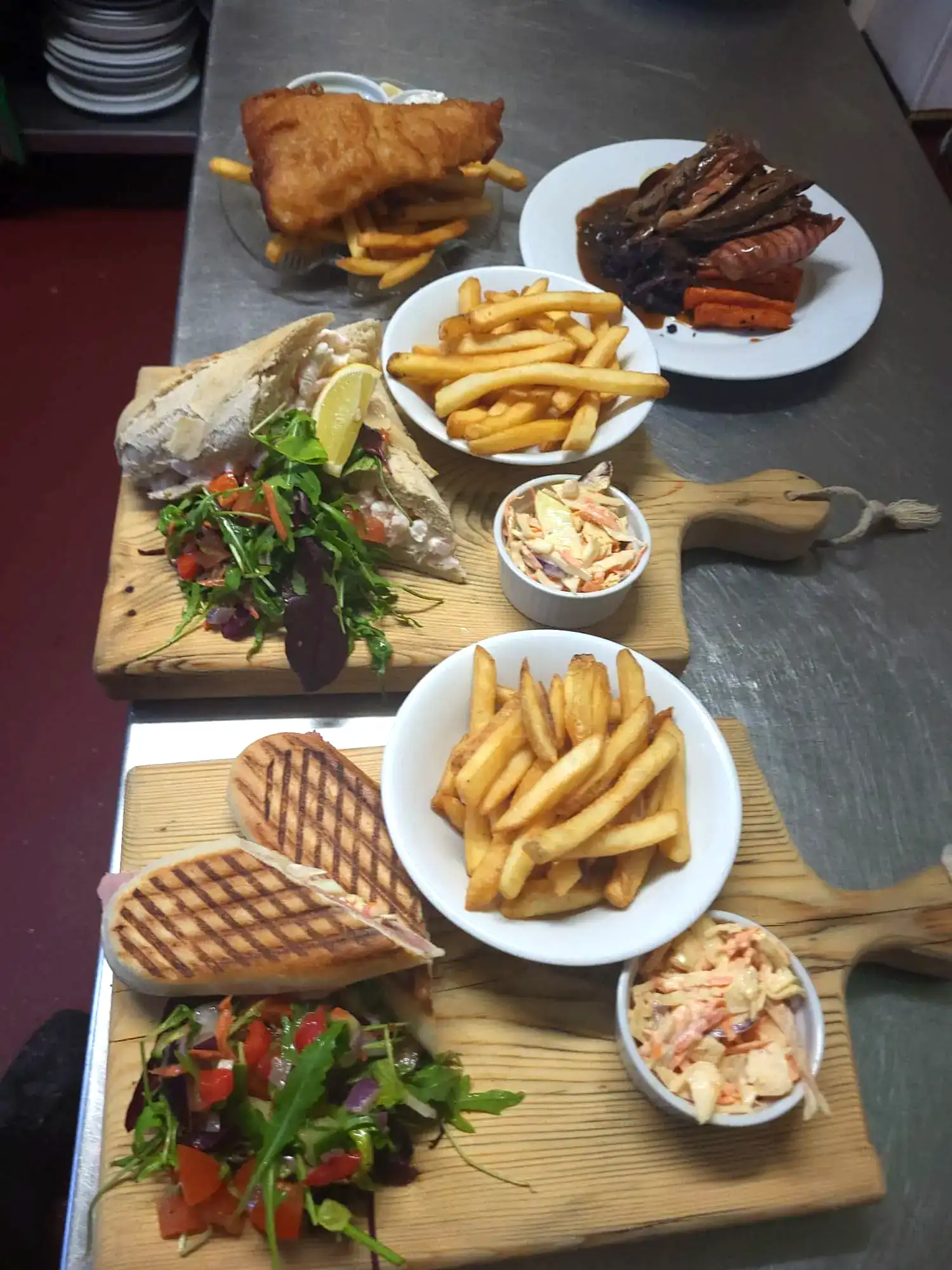 A table topped with a selection of food.